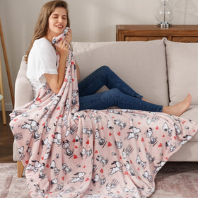 Berkshire Blanket Peanuts blush hearts pattern highlighting playful character vibes.
