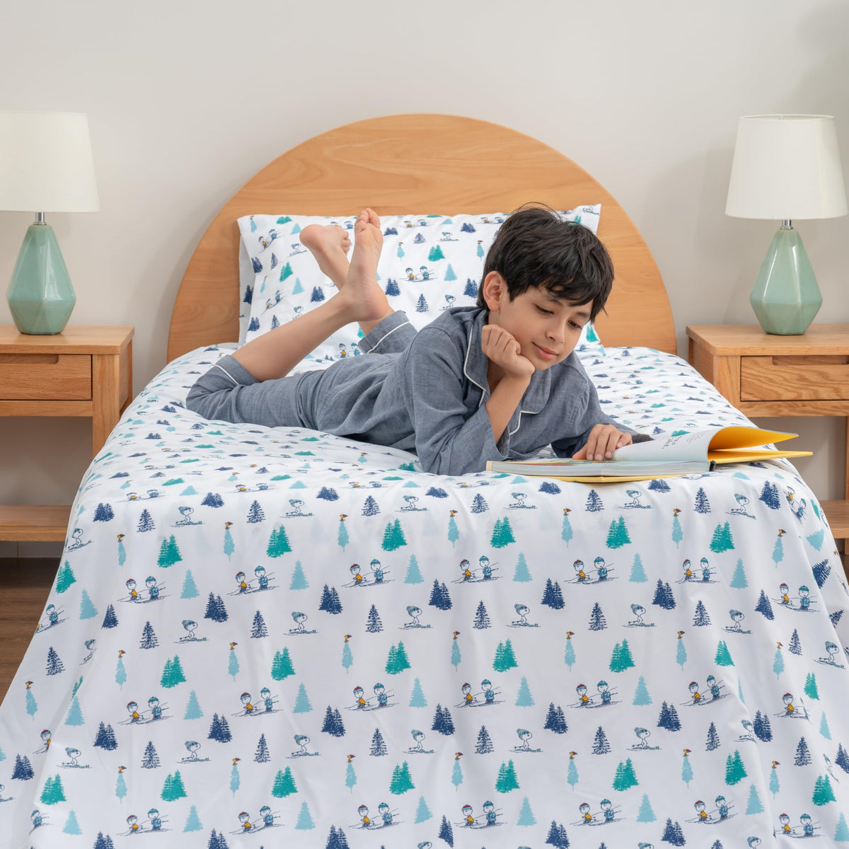 Berkshire Blanket Snoopy Winter Wonderland graphic sheet, playful bedtime scene.