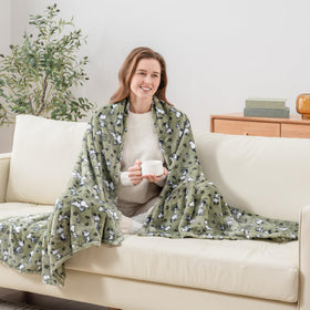 VelvetLoft fabric in loden color on Berkshire Blanket Peanuts throws for family room fun.