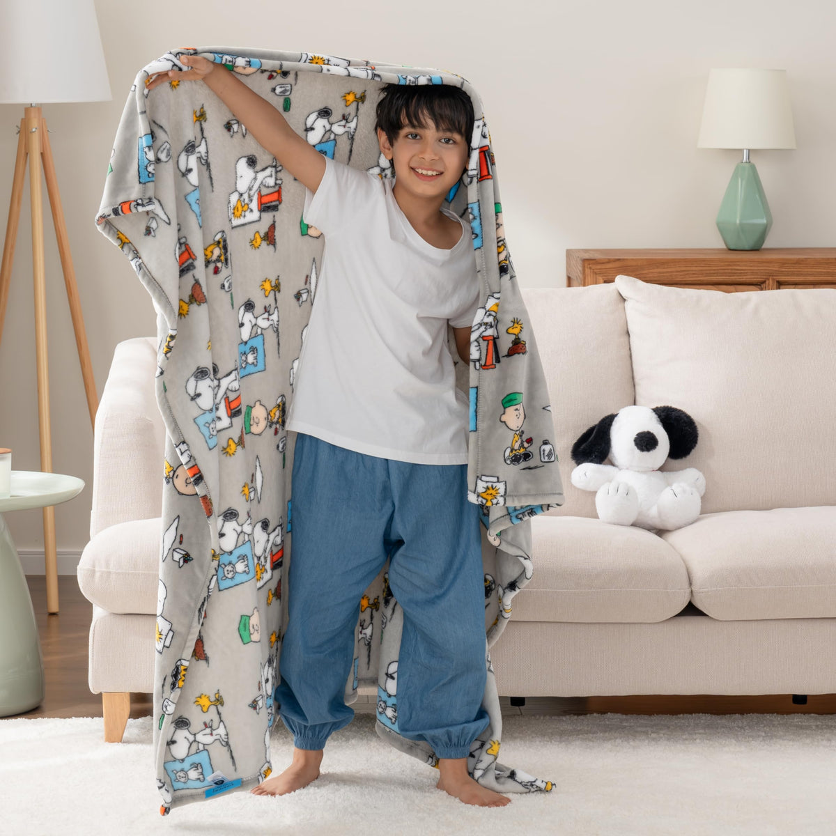 Snoopy plush character close-up highlights a cuddly, kid-friendly companion for bedtime reading.