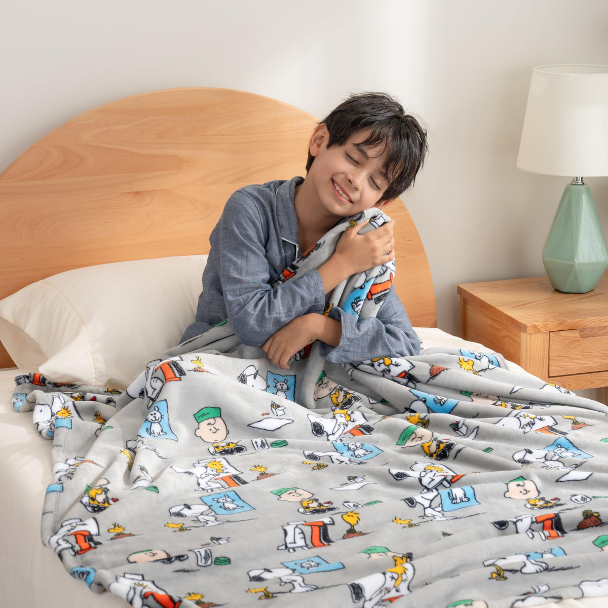 Oversized throw in grey color adds soft decor and easy wrapping during chilly days.
