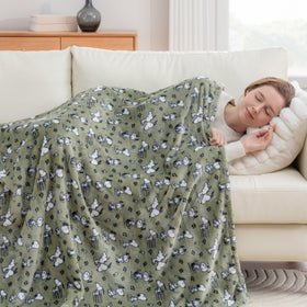 Berkshire Blanket Peanuts VelvetLoft throw draped on couch for full coverage.