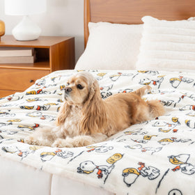 Kids cuddling with Berkshire Blanket Peanuts VelvetLoft throw