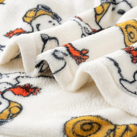 Snoopy throw on couch ideal for kids and relaxation