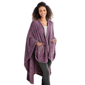 Berkshire Blanket Primalush wearable blanket in purple draped over shoulders for cozy lounging.