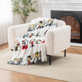 Berkshire Blanket VelvetLoft Snoopy throw on couch for cozy movie night