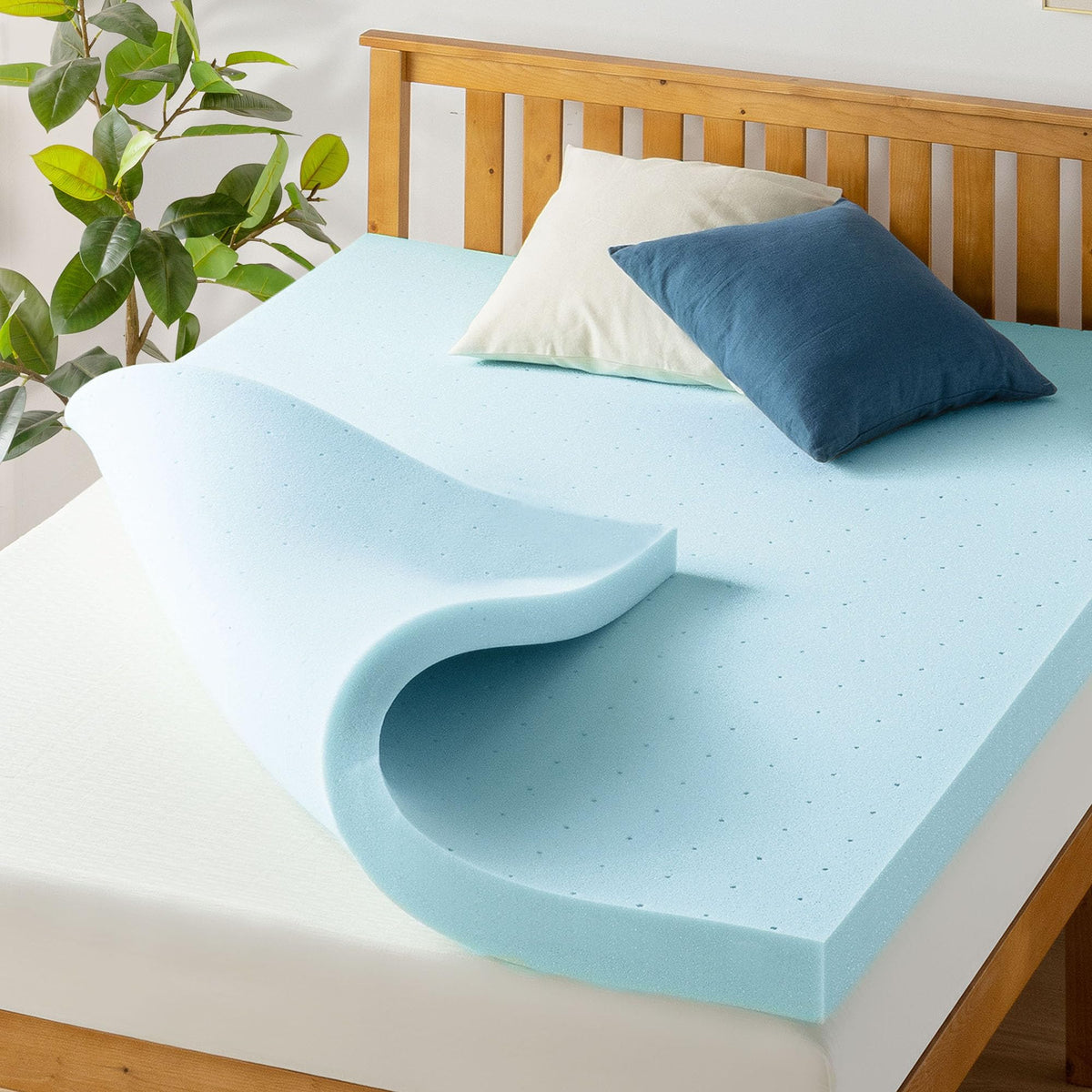 Best Price Mattress 4in vented topper demonstrates even support and cooling.