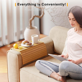Bestjing sofa side table in use beside the armrest.