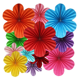BestoFun 14-inch paper flower fans decorate a wall with vibrant Mexican colors.
