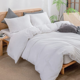 Bright white Bestouch bedding setup on a modern bed