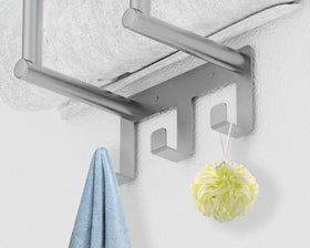 Bethom towel rack with top shelf holds large rolled towels for bathroom storage.