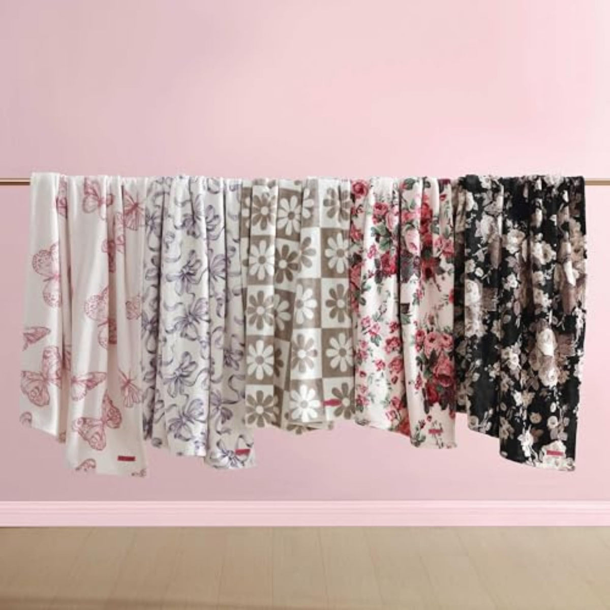 Betsey Johnson blanket cozy couch scene highlights relaxed evenings on the couch.