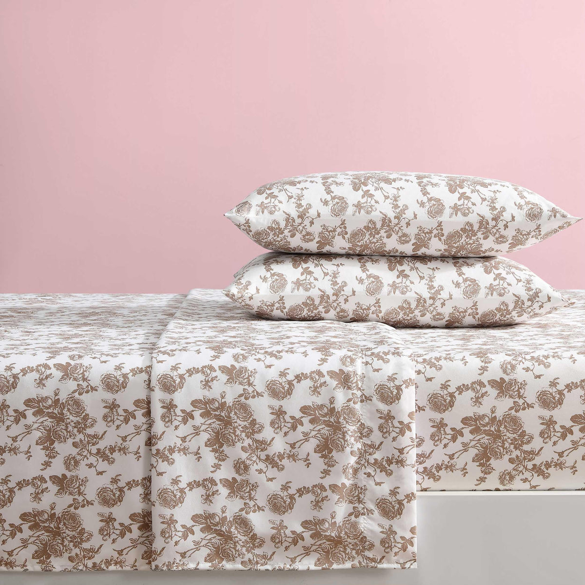 Betsey Johnson queen bed sheets in a cozy bedroom setup with warm color tones.