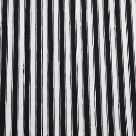 Betsey Johnson Sketchy Stripe design adds playful charm to a modern bedroom.