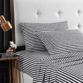 Close-up of the fitted sheet corner showing the deep pocket for a snug fit.