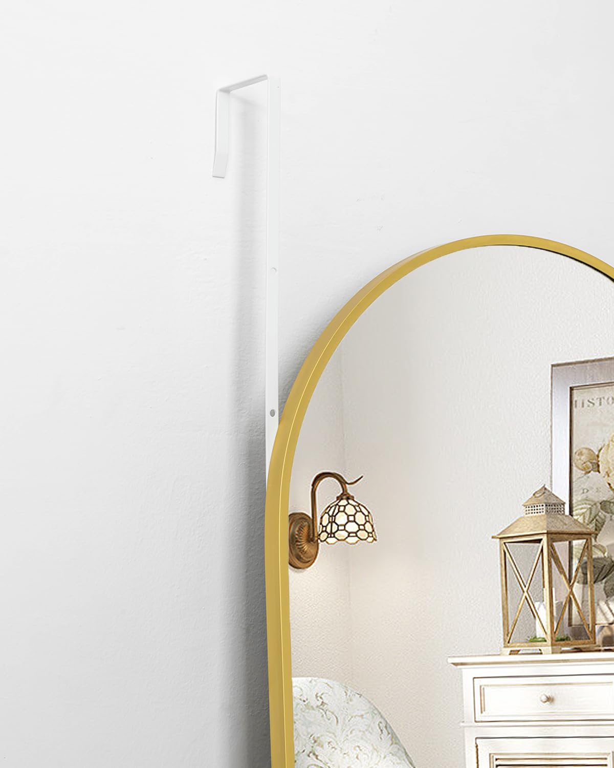 BEVERDY arch door mirror with black frame for a modern look.