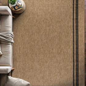 Beverly Rug Easy Jute Border Rug 5x7 at entryway with non-slip backing.