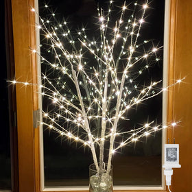 Bexdir Lighted Birch Branches 33in full view with vibrant twinkle LEDs for festive ambiance.