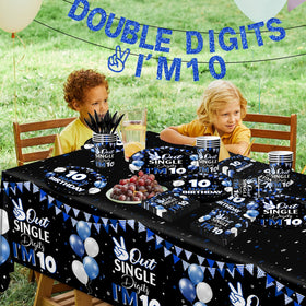 Bezkega navy blue tablecloth sets elegant base for a 10th birthday celebration.