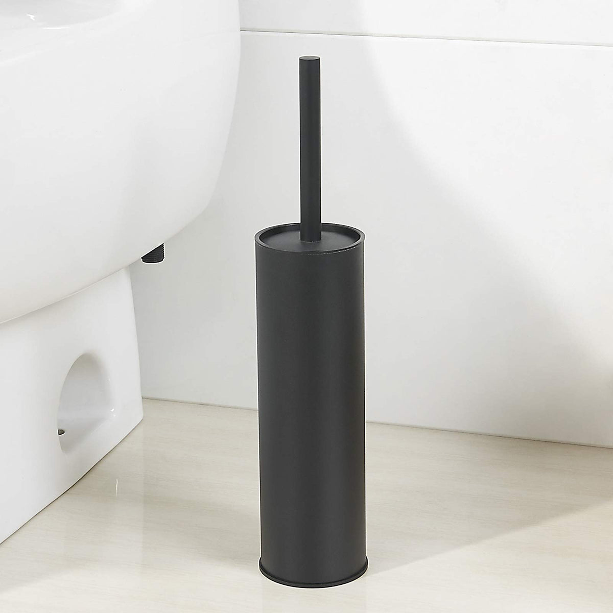 BGL compact storage solution keeps the toilet brush hidden yet ready.
