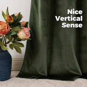 BGment living room setup with olive velvet curtains, deep color and privacy.