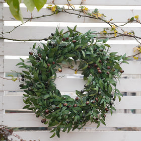 BHHDA Olive Wreath shown on door with hanging loop for easy display.