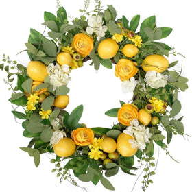 Bibelot 20 inch lemon wreath on front door with yellow lemons and white hydrangea.