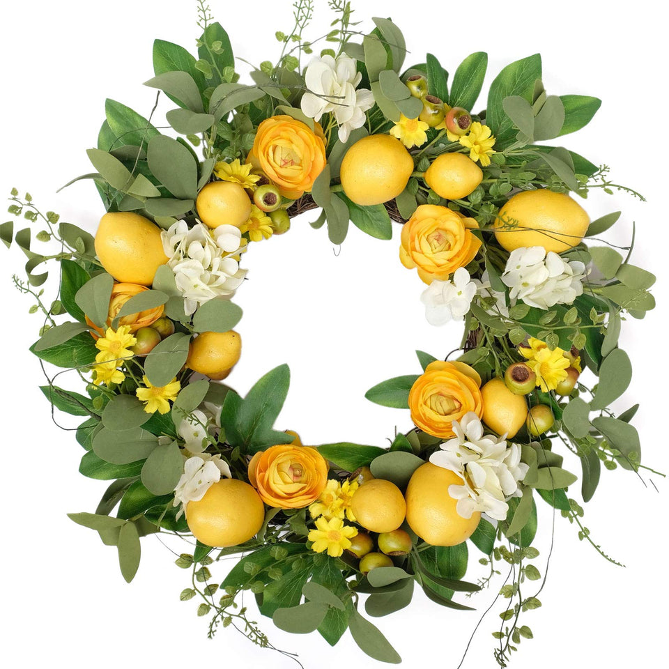 Bibelot 20 inch lemon wreath on front door with yellow lemons and white hydrangea.