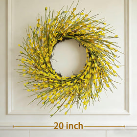 Bibelot Forsythia wreath close-up highlights lifelike leaves detail.