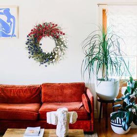 Bibelot outdoor indoor floral wreath suitable for porches and windows.