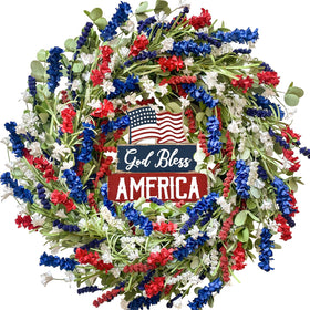 Bibelot patriotic wreath front door display with vibrant red white blue flowers to welcome guests.