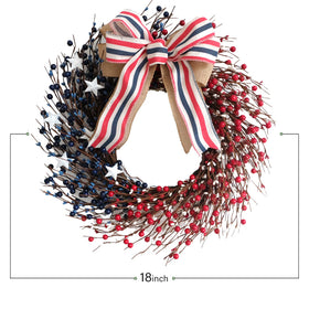 Bibelot patriotic berries wreath featuring stars and burlap bow for festive charm.