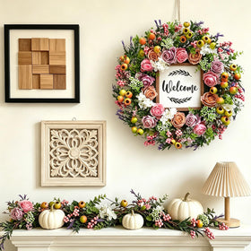 Bibelot welcome sign wreath artfully greets guests at entry.