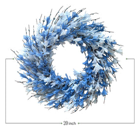 Bibelot wreath hanging on door enhances entryway with spring vibe