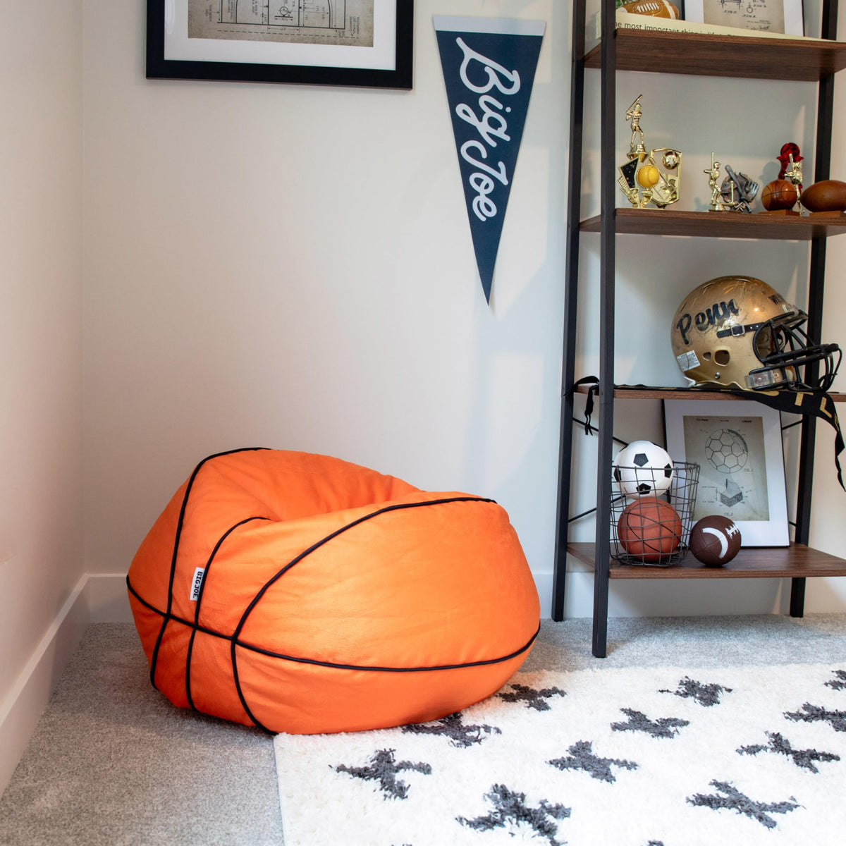 Big Joe sports ball bean bag chair featuring football detail sparks fun seating beside game nights.