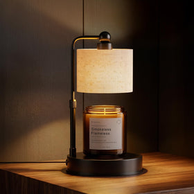 Bingyouth candle warmer lamp demonstrates adjustable height for tall jars.