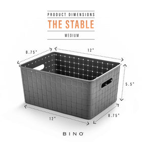 BINO plastic storage basket with handles ready for versatile home organization.