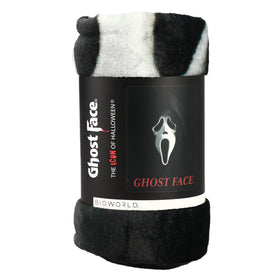 Bioworld Ghost Face Throw Blanket draped on sofa, showcasing large Scream print.