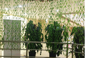 Bird Fiy hanging vine on banister for space-saving accent