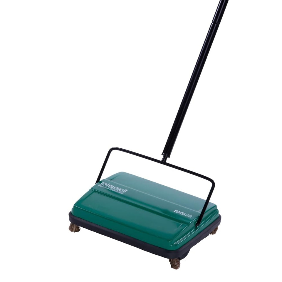 Bissell Commercial BG22 manual sweeper in green, ideal for quick surface cleanup.