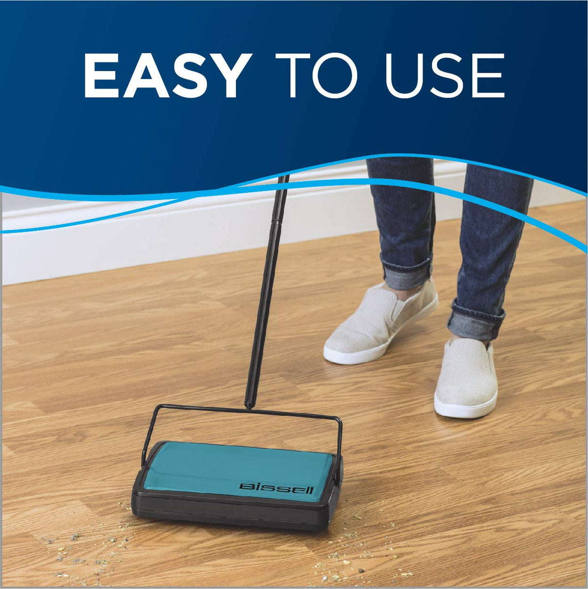Bissell Easy Sweep teal removes hair and debris from area rugs