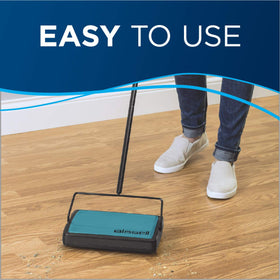 Bissell Easy Sweep teal removes hair and debris from area rugs