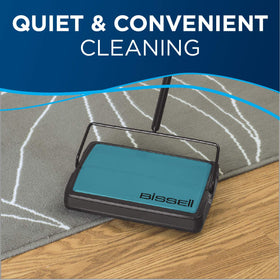 Bissell Easy Sweep teal uses dual bottom-empty bins for simple disposal