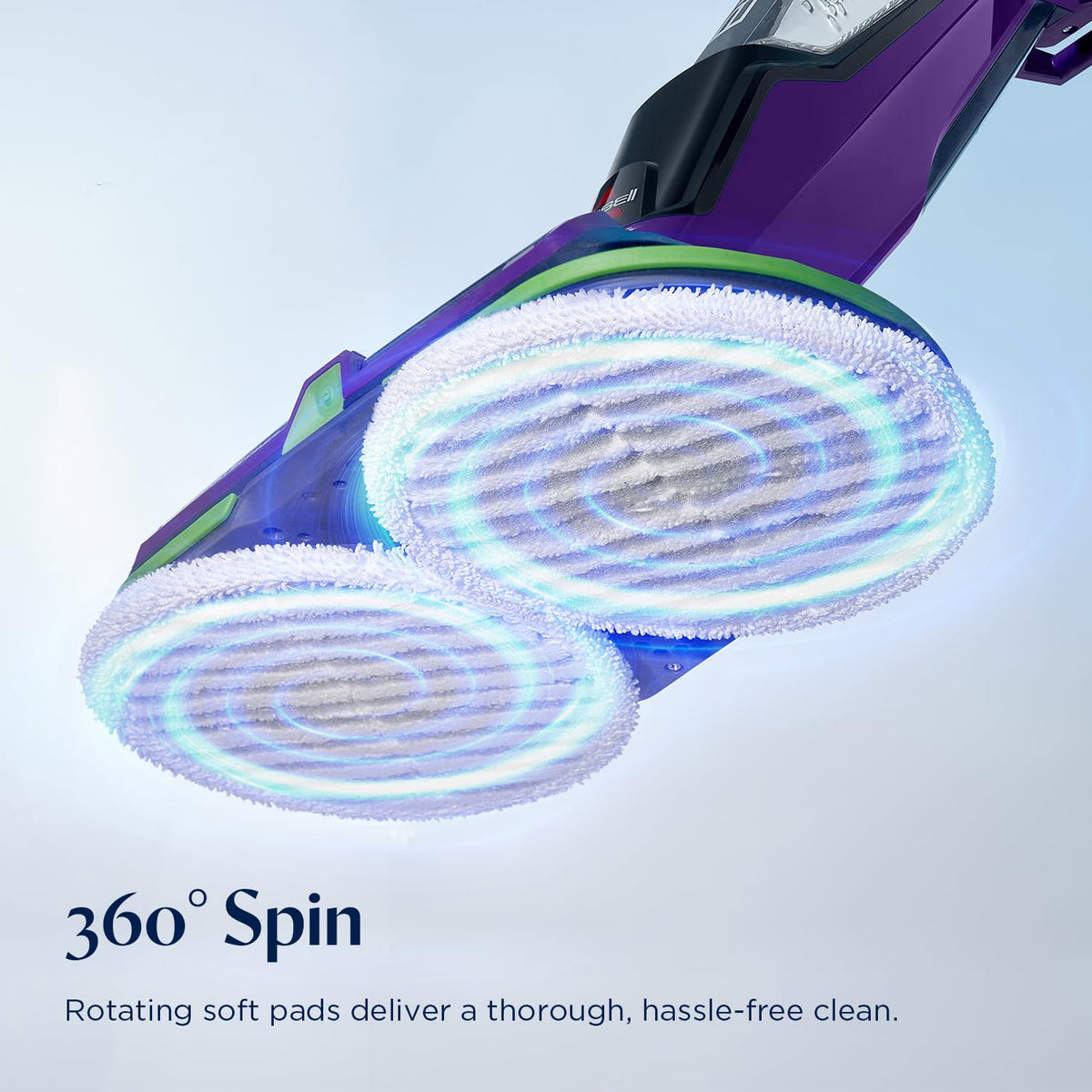 Bissell SpinWave spray dispenser close-up for rapid, targeted stain removal.