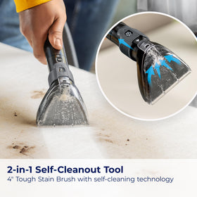Bissell TurboClean Pet 7 ft hose extended for above-floor cleaning.
