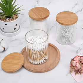 BKYFPQ apothecary jar with lid enhances bathroom decor while organizing cotton swabs.