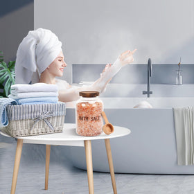 BKYFPQ on countertop with decor accents shows stylish bathroom organization.