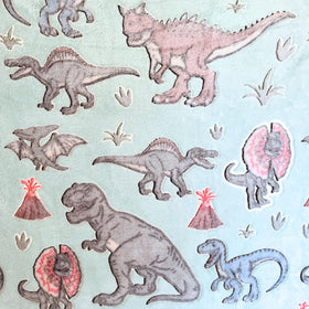 Blanket Buddies dino room decor idea enhances a dinosaur-themed space.