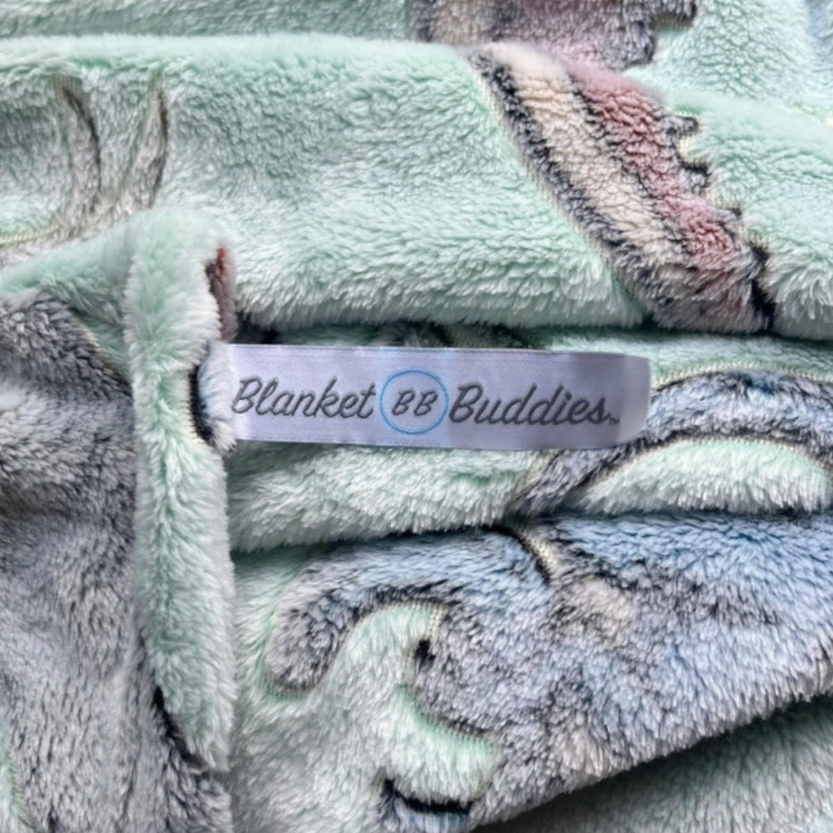 Blanket Buddies pterodactyl silhouette offers a lightweight, cozy throw.