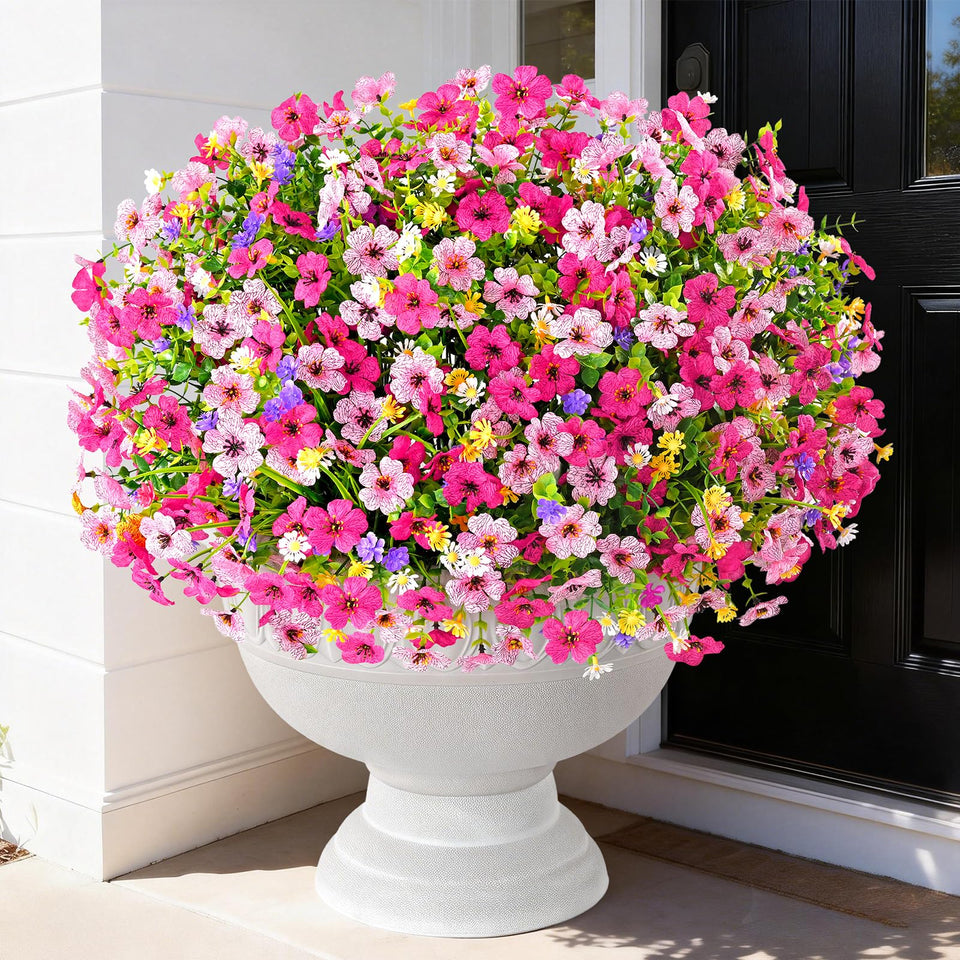 BLEUM CADE outdoor flowers: violets, daisies, and boxwood for a vibrant porch display.